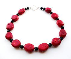 Chunky Red Coral Necklace - Statement Red and Black Beaded Necklace  - Coral Jewelry - Beadwork Jewelry - Toggle Clasp - Big Skies Jewellery Handmade Red Oval Necklace, Red Beaded Necklaces With Natural Stones, Unique Red Oval Beaded Necklaces, Unique Red Oval Beads Necklace, Unique Red Necklaces With Oval Beads, Red Oval Gemstone Bead Jewelry, Red Oval Jewelry With Gemstone Beads, Red Oval Gemstone Beads Jewelry, Red Oval Gemstone Beaded Jewelry