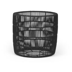 a black basket sitting on top of a white surface