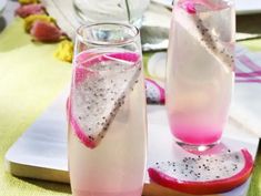 two glasses filled with watermelon and pink liquid