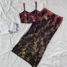 Y2k beaded fairy mermaid silk skirt set Stunning metallic colors ombre from pink to gold💖 Fully lined, 100% silk overlay with all over hand beaded floral design. Strappy back details, beaded tassels hang from top, side slits on skirt. No stretch to material. Excellent vintage condition (may be missing a bead here and there, nothing noticeable at all) 🤍SIZE & MEASUREMENTS:  Tag size: S Measurements: (natural/flat across) (Top; Pit to pit: 16.25" Length: 7" ) (Skirt; Waist: 13.5" Length: 35.5") Fitted Multicolor Skirt Set For Party, Fitted Belly Dance Sets For Party, Festive Beaded Party Sets, Dark Fairy Outfit, Vintage Skirt Outfit, Colorful Y2k, Beaded Fairy, Silk Overlay, Beaded Skirt