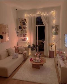 a living room filled with furniture and lights