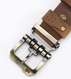 Enhance your outfit with our Luxury Strap Pin Buckle Belt. Made from premium leather, this belt exudes elegance and style. The pin buckle adds a touch of sophistication, making it a perfect accessory for formal or casual occasions. Elevate your fashion game now! ✨ Features: 🔥 High-Quality Split Leather: Crafted from genuine split leather for a luxurious look and long-lasting durability. 👔 Versatile Belt Width: 3.8cm width complements both formal and casual outfits, allowing you to express your Brown Leather Belt Buckle With Metal Pin, Brown Belt With Rectangular Buckle For Business, Brown Belts And Suspenders With Antique Buckle For Business, Leather Pieces, Mens Luxury, New Launch, Buckle Belt, Belt Buckles, Leather Belt