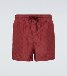 GG swim trunks in burgundy - Gucci | Mytheresa Nylon Swim Trunks With Side Pockets, Gucci Swimwear For Summer, Gucci Beachwear Swimwear For Summer, Casual Gucci Bottoms With Elastic Waistband, Gucci Beachwear For Summer, Swag Men, Gucci Outfits, Gucci Eyewear, Terry Shorts