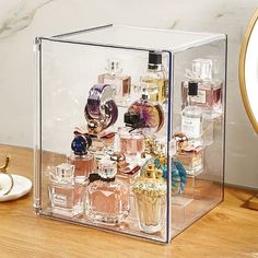 Say goodbye to cluttered desktops together, this beautiful luxury perfume or cosmetic stand organizer will complement any bathroom or dressing table, providing plenty of storage space for all of your belongings, keeping your makeup, skincare and perfume in one stylish place. In addition to this, you can also collect mini figure models, toys, etc., you can also put some dolls and bags by removing the dividers, it's super convenient to have two ways to use one box, come on to add a delicate and pr Perfume Stand, Perfume Storage, Acrylic Nail Polish, Perfume Display, Acrylic Organizer Makeup, Perfume Organization, Acrylic Cabinets, Acrylic Display Stands, Beauty Organization