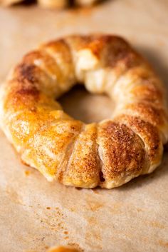 a close up of a doughnut on a baking sheet