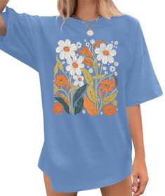 PRICES MAY VARY. MATERIAL: This oversized flower shirt is made of 60% cotton, 35% Polyester,5% Spendex, soft and comfortable. The fabric is lightweight, and the clothes adopt high-quality printing technology, and the pattern is clear and natural. SPECIAL DESIGN: This oversized flower graphic shirts for women, cute botanical t-shirt, summer wildflowers lover tee, Boho floral graphic, cute casual round neck, vintage floral graphic tees, cute flower short sleeve shirt with unique design makes it po Womens Tee Shirts, Printed Shirt Designs Women, Boho T Shirt Design, Graphic Design Tee Shirt, Cute Amazon Tops, Cute Vinyl Shirts Women, Amazon Graphic Tees, Clothes Adopt, Cute Oversized Shirts