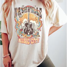 Zoe + Liv Nashville Music City Colorful T-Shirt Fun Festival Boho Lightweight Statement Piece To Rock With Any Look Nwt Size: X-Large 60% Cotton 40% Polyester Urban Style Summer Tops For Concerts, Spring Music Festival Relaxed Fit T-shirt, Relaxed Fit T-shirt For Spring Music Festival, Spring Concert T-shirt With Letter Print, Urban Style Summer Concert T-shirt, Spring Concert Crew Neck T-shirt, Spring Music-themed Letter Print Tops, Music-themed Relaxed Fit Tops For Summer, Graphic Tee For Spring Concert