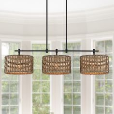 This farmhouse style linear island chandelier light features matte black hardware and 3 drum shades which are meticulously hand-woven of natural rattan/wicker, makes it a unique hanging pendant lights for above kitchen island and dining table or cafe bar. This collection can work with a variety of boho decors and even work in homes with coastal or farmhouse styling True Fine Villa 3-Light Matte Black Coastal Led Chandelier | TD10049C Flaming Arrow, Master Addition, Farmhouse Chandelier Lighting, Coastal Chandelier, Linear Island Lighting, Rattan Chandelier, Drum Pendant Lighting, Rattan Shades, Rattan Pendant Light