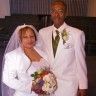 a bride and groom posing for a photo