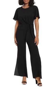 A belted waist cinches this wide-leg jumpsuit designed in flirty flutter-sleeved silhouette. 59 1/2" full length (size 4) Crew neck Short sleeves Back zip closure Lined 97% polyester, 3% spandex Machine wash, dry flat Imported Model Stats: 5'10" height; 34" bust; 27" waist; 35" hips. Model is wearing size 4. Formal Short Sleeve Jumpsuit Or Romper, Formal Short Sleeve Jumpsuits And Rompers, Formal Solid Short Sleeve Jumpsuits And Rompers, Formal Solid Belted Jumpsuit, Elegant Wide Leg Belted Jumpsuits And Rompers, Black Belted Jumpsuits And Rompers For Evening, Black Belted Jumpsuit For Evening, Night Out Belted Jumpsuits And Rompers, Formal Black Belted Jumpsuit