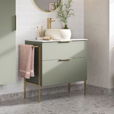 a bathroom with a sink, mirror and towel rack