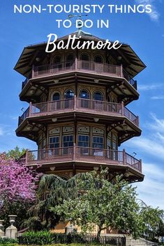 a tall tower with the words non - tourist things to do in baltimore