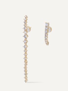 The Athalia earrings are a statement of elegance with a touch of spontaneity. A playful and trendy duo featuring one thin elongated stud and one dangling strand. Long Earrings, Rhodium Plated, Shop Earrings, Gold Earrings, Cubic Zirconia, 18k Gold, Plating, Brass, Silk