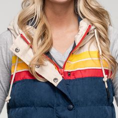 The Epic Fader Puffer Vest is the ultimate fusion of function and fashion. With its vibrant, vintage-inspired exterior and cozy layer of soft micro-flannel on the inside, this retro puffer vest looks as good as it feels. The fill is 100% polyester and the outside fabric is a plush, water-resistant cotton. Additional features are 2 inside pockets and high-quality YKK® Zippers. Get one now and let your retro style shine! Female Model is 5'7" / 125 lbs and is wearing a size XS Male Model is 5'11" / Trendy Cotton Puffer Jacket For Outdoor, Casual Cotton Puffer Jacket With Double-lined Hood, Casual Fall Vest With Detachable Hood, Outdoor Cotton Puffer Jacket With Detachable Hood, Outdoor Vest With Detachable Hood For Fall, Outdoor Fall Vest With Detachable Hood, Fall Outdoor Vest With Detachable Hood, Hooded Puffer Vest For Outdoor, Sporty Hooded Vest For Winter