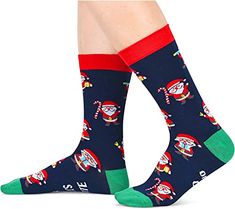 Santa SocksOur Santa socks feature various jolly depictions of Santa Claus, from holding candy canes to dancing happily, on a vibrant black background. The bottom is sewn with a hilarious hidden message: "SANTA’S FAVORITE HO HO HO".Size & PackageOur unisex design fits most men's US size 6-13 feet and most women's US size 7 and up. Each exclusive gift box contains one pair of funny socks.Quality MaterialOur novelty socks are made of 80% Cotton, 15% Polyamide, and 5% Elastane to ensure they are so Christmas Vacation Gifts, Medical Socks, Radiologist Gifts, Guitar Lover Gifts, Nurse Socks, Xmas Socks, Christmas Santa Gifts, Christmas Socks Gift, Socks Gifts