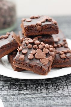 chocolate brownies are stacked on top of each other