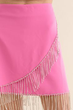 You will not want the night to end in this wrap mini skirt. Features rhinestones fringe detailing and a hot pink hue. It zips up in the back and is made of a polyester fabric. It doesn't stretch but runs true to size. A statement piece that you'll love. Bling Skirt, Wrap Mini Skirt, Pink Bling, Pink Skirt, Western Dresses, Statement Pieces, Mini Skirt, Hot Pink, Polyester Fabric