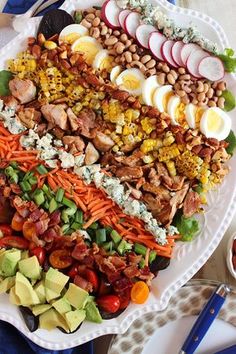 a large platter filled with lots of different types of food on top of a table