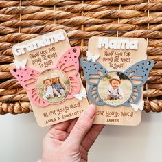 two handmade cards with the words grandma and baby on them, sitting in front of a wicker basket