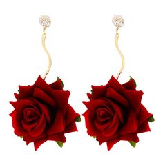 a pair of earrings with a red rose attached to the back of each earring