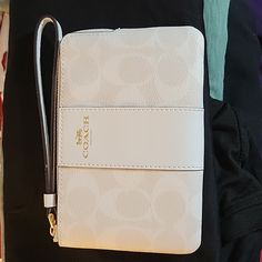 Coach White And Gold Wristlet Nwot Holds Two Cards Also! Elegant White Clutch With Zipper Closure, White Rectangular Clutch With Zipper Closure, White Clutch With Zipper Closure For Travel, White Rectangular Wallet With Zipper Closure, Everyday White Clutch With Zipper Closure, White Pouch Wallet With Zipper, White Clutch Wristlet With Zipper Closure, Everyday White Clutch Wallet, White Clutch Wristlet With Wrist Strap