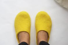 Felted slippers for women of bright yellow wool - an excellent gift for Christmas, birthday or housewarming. Felt is a perfect material for footwear. It is extremely wear-proof and warm. When you put them on, you won't want to take the slippers off. They will definitely make a part of your home outfit. Non-slip sole is covered with natural latex. Now slippers are also available in rubber soles. Please follow the link if interested https://www.etsy.com/listing/100254500/rubber-soles-for-felted-sl Comfortable Yellow Flat Slippers, Casual Yellow Slippers With Rubber Sole, Yellow Non-slip Slippers With Round Toe, Yellow Non-slip Round Toe Slippers, Comfortable Yellow Slip-on Slippers, Comfortable Non-slip Yellow Slippers, Comfortable Yellow Non-slip Slippers, Comfortable Yellow Round Toe Slippers, Comfortable Yellow Closed Toe Slippers