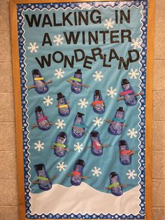 a bulletin board with snowmen on it that says walking in a winter wonderland,