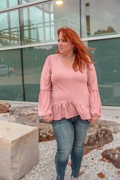 How fun is this mauve pink peplum top!? The scoop neck and bubble sleeve details make this fun top so dainty and cute. Whitney is 5'6 and is wearing a size 1X Large. Pink Peplum Tops Affordable, Pink Feminine Peplum Top, V-neck Peplum Top For Summer, Peplum Maternity Top, Pink Peplum Top, Feminine V-neck Peplum Top, Peplum Tops, Bubble Sleeve, Mauve Pink