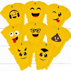 a group of yellow shirts with different emoticions on them