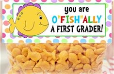 a fish themed birthday party treat in a bag with the words, you are fish ally a first grader