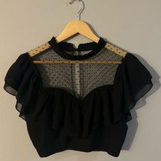 Never Worn!! Perfect Quality, Just Doesn’t Fit Me. Accepting Offers :) Black Short Sleeve Crop Top For Evening, Party Ruffle Crop Top Blouse, Party Ruffled Crop Top Blouse, Ruffled Crop Top Blouse For Party, Elegant Black Short Sleeve Crop Top, Black Ruffled Crop Top For Night Out, Black Ruffled Crop Top For Party, Black Short Sleeve Party Blouse, Elegant Black Ruffled Crop Top