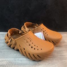 Brand New Crocs Echo Clog Sand Kids Size J5 / Women’s Size 7 Kids Size J6 / Women’s Size 8 *Please Note* These Are Kids Sizes Converted To Women’s Sizes For This Listing. Platform Closed Toe Clogs For Outdoor, Outdoor Platform Clogs With Closed Toe, Outdoor Slip-on Platform Clogs, Summer Non-slip Brown Clogs, Brown Non-slip Closed Toe Clogs, Brown Closed Toe Non-slip Clogs, Crocs Echo Clog, Echo Clog, Crocs Echo