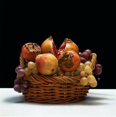 a basket filled with lots of different types of fruit