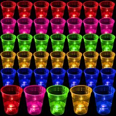 many different colored plastic cups with lights on them