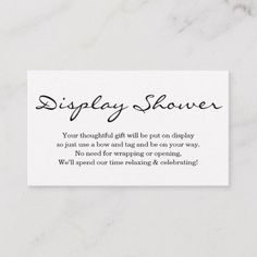 a white business card with the words display shower on it's front and back