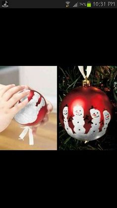 someone is decorating a christmas ornament with white snowmen on red balls