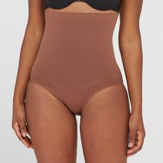 Talk about results! This lightweight brief uses targeted zones to tone your tummy and give you a perky rear view. The high waist offers added tummy control and eliminates muffin top without digging in, while the seamless design provides all-day comfort and support that won't show through (bye, visible panty lines!). Size: XXL. Color: Chestnut Brown. Gender: female. Age Group: adult. Pattern: Solid. Material: Nylon. Supportive Fitted High-waist Bottoms, Supportive High Waist Fitted Bottoms, Supportive Shapewear Bottoms With Wide Waistband, Fitted Seamless Brown Shapewear, Fitted Brown Shapewear Bottoms, Seamless Brown Shapewear, High-waist Sculpting Bottoms With Seamless Construction, High Waist Sculpting Bottoms With Seamless Construction, Supportive High Waist Shapewear With Wide Waistband