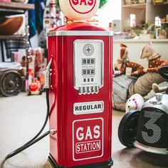 an old fashioned gas pump sitting on top of a table