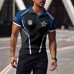 a man walking down the street wearing a black and blue shirt with stars on it