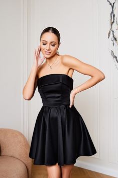 Fabric: satin Viscose 35%, Polyester 35%, Cotton 20% Nylon 10% Straight across neckline Strapless Flared skirt Zipper lock at the back Mini length Homecoming 2024, Flared Mini Dress, Strapless Dresses Short, Straight Across Neckline, Zipper Lock, Skirt Zipper, Wear Store, Satin Long Sleeve, Grad Dresses