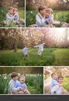 two young boys playing in the grass with their arms around each other, and one boy holding