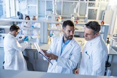 Mid adult male chemists talking while working on scientific research in laboratory. Medical Laboratory Science Student, Scientist Aesthetic, Test Subject, Medical Laboratory, Laboratory Science, Science Student, Scientific Research, Free Stock Photos Image