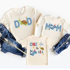 two matching shirts with the words mom and one for the sea on them