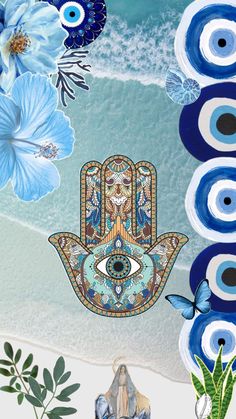 the hamsah is surrounded by blue flowers and other things on the beach, with an evil eye in the center