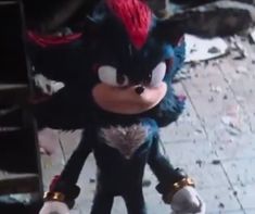 an image of a stuffed animal that looks like sonic the hedgehog with red hair