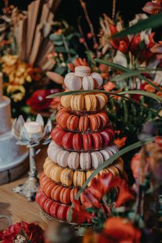 a stack of macaroons sitting on top of a table