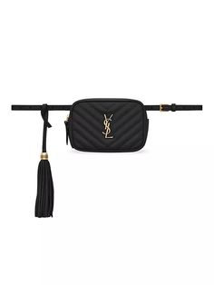 Adjustable belt bag with metal YSL initials on the front, featuring a removable pouch and a leather tassel..Dimensions: 15.5 x 10.5 x 5.5 cm / 6.1 x 4.1 x 2.1 inches.Bronze metal hardware.Adjustable buckle closure.Two inside pockets.Three card slots.One outside zippered pocket.Saint Laurent Paris-engraved plate.Exterior: one zippered pocket.Interior: two inside pockets, three card slots.100% Calfskin leather.Made in Italy.Adjustable belt bag with metal YSL initials on the front, featuring a remo Lou Camera Bag Ysl, Ysl Tassel Bag, Saint Laurent Pouch, Ysl Crossbody Bag Black Tassel, Saint Laurent Bags, Closet Organizer, Leather Luggage, Bronze Metal, Adjustable Belt