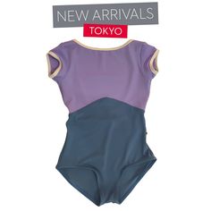 a purple and blue one piece swimsuit with the words new arrivals tokyo on it