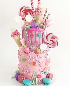 a pink cake with lots of candy and candies