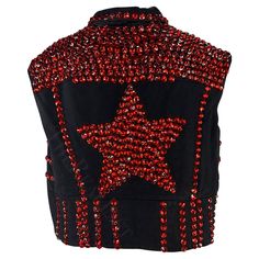 Presenting an incredible black denim Dolce and Gabbana denim vest. From the Spring/Summer 1992 collection, this flashy vest is covered in red rhinestones that line each seam and are also used to create a heart design at the front and a large star at the back. A rare find, this Dolce and Gabbana ‘gem’ is a must-have addition to any wardrobe. Approximate measurements: Size - removed Shoulder to hem: 19" Bust: 42" Waist: 44" Luxury Fitted Gothic Vest, Red Embroidered Sleeveless Vest, Heart Vest, Red Gothic Sleeveless Top, Dolce And Gabbana Patchwork, Dolce And Gabbana Denim, Red Rhinestone, Denim Vest, Dolce & Gabbana